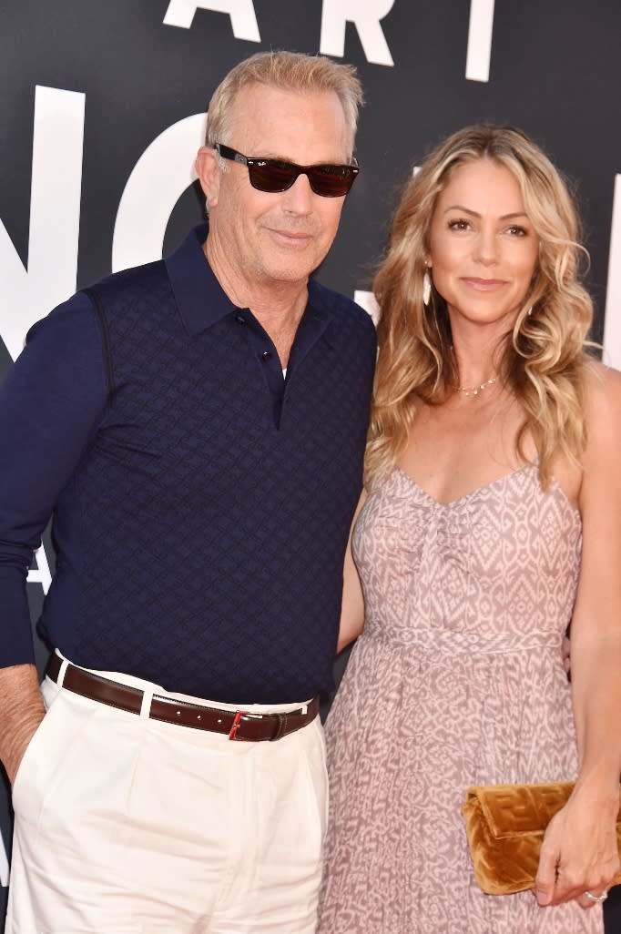 Premiere Of 20th Century Fox's "The Art Of Racing In The Rain" at El Capitan Theatre on August 01, 2019 in Los Angeles, California. 01 Aug 2019 Pictured: Kevin Costner, Christine Baumgartner.