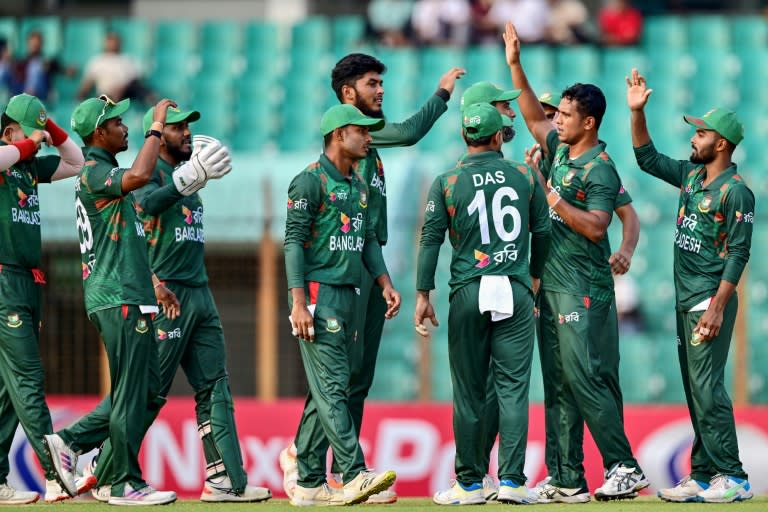 Bangladesh players celebrate during the third Twenty20 international cricket match against Zimbabwe in Chittagong (Munir UZ ZAMAN)