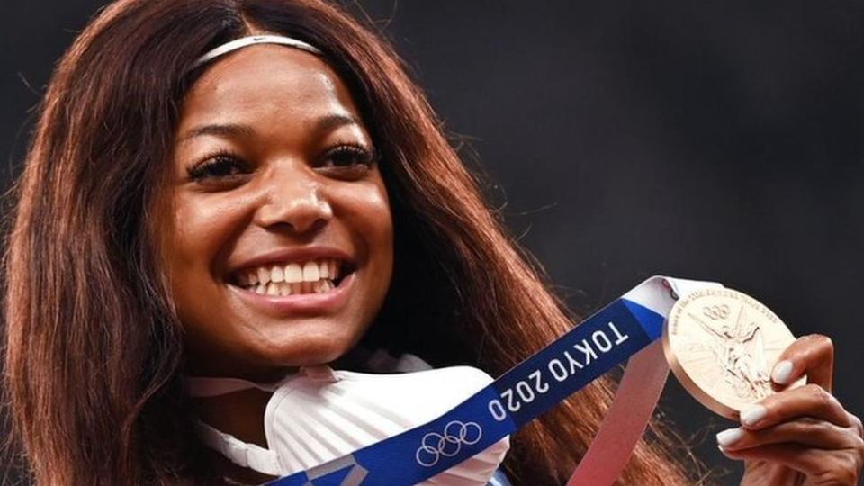 US sprinter Gabby Thomas celebrates winning a bronze medal at the Tokyo Olympics