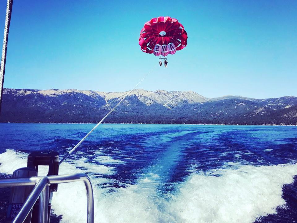 the writer parasailing in Lake Tahoe