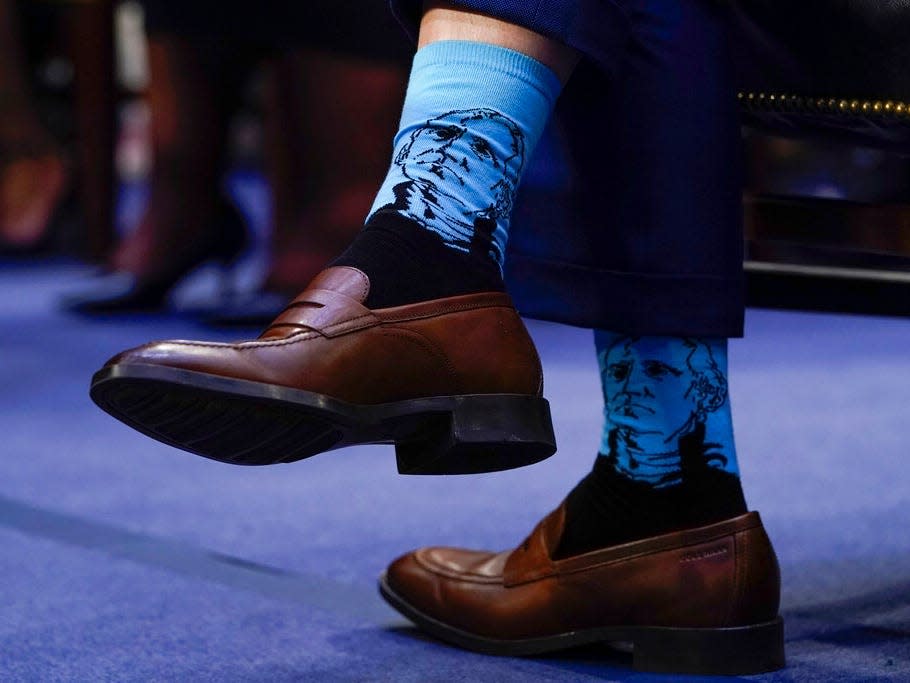 Judge Ketanji Brown Jackson's husband Dr. Patrick Jackson wears blue socks with George Washingtons' face on them