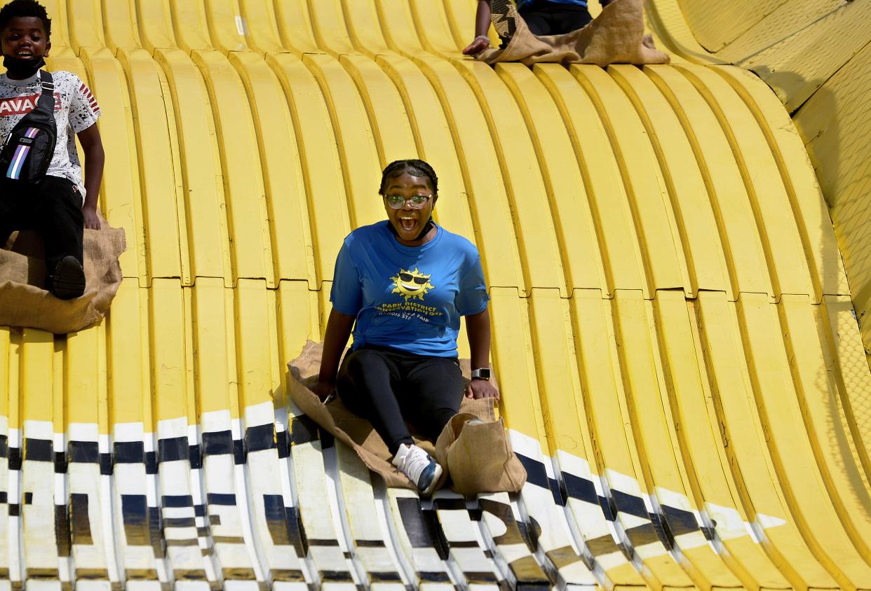 Diana Holmes, 13, of Chicago reacts as she goes down the Giant Slide at the Illinois State Fair Saturday August 20, 2022.