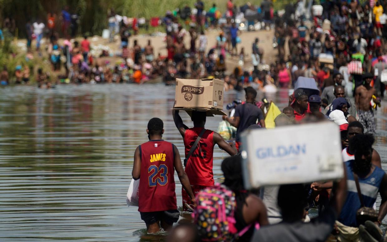 US dispatches 1000 border force officers as it scrambles to contain Haitian migrant crisis on Rio Grande - Eric Gay /AP