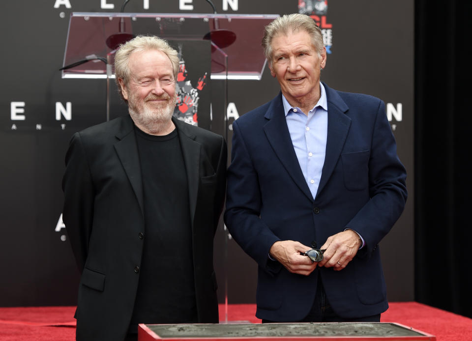 Director Sir Ridley Scott, left, and actor Harrison Ford pose together following a hand and footprint ceremony for Scott at the TCL Chinese Theatre on Wednesday, May 17, 2017 in Los Angeles. Scott directed Ford in the classic 1982 science fiction film 