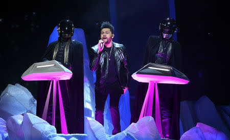 The Weeknd performs. REUTERS/Lucy Nicholson