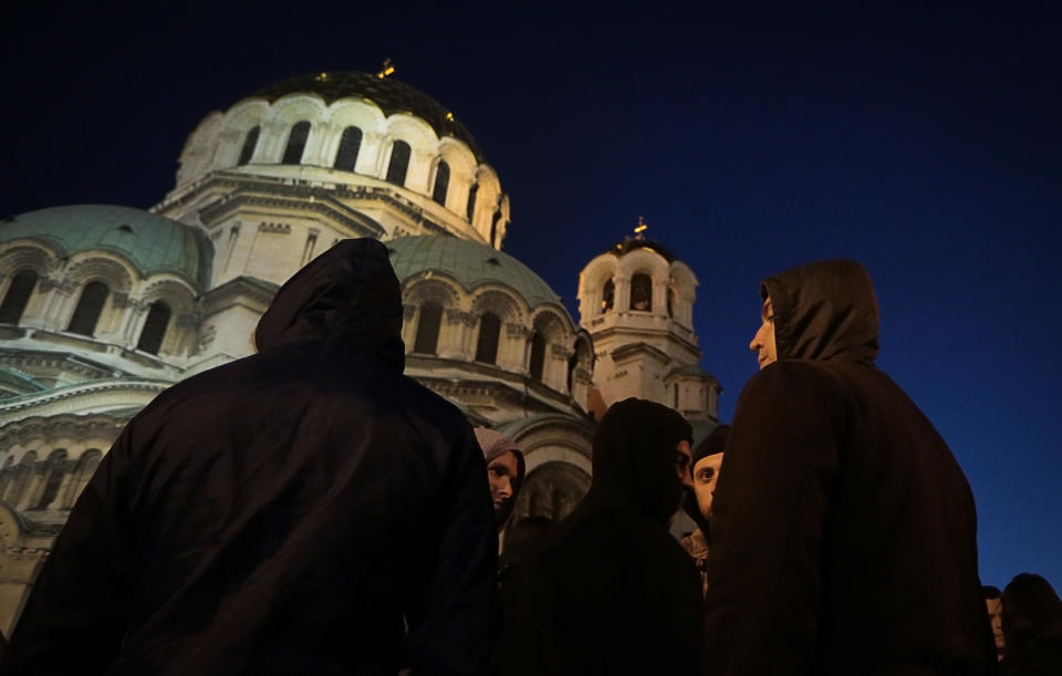 Bulgarian far-right nationalists gather near Alexander Nevsky cathedral in Sofia, Saturday, Feb., 15 2014. Hundreds of Bulgarian nationalists have marched through the capital to honor a World War II general known for his anti-Semitic and pro-Nazi activities, athough Sofia's mayor had banned Saturday's rally, organized by the far-right Bulgarian National Union. (AP Photo/Valentina Petrova)