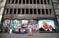 A mural of Donald Trump embracing Boris Johnson is seen on a building in Bristol, Britain May 24, 2016. REUTERS/Peter Nicholls