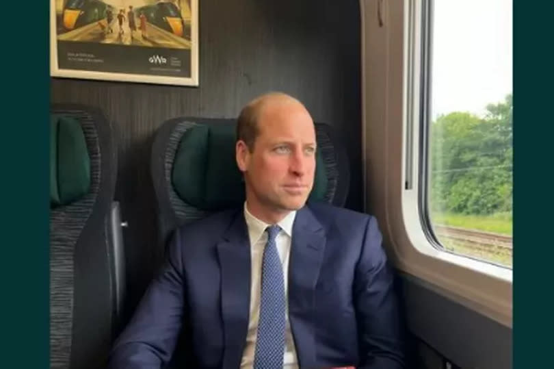 William pictured with a personal folder and his iPhone on the train to Cardiff -Credit:Instagram