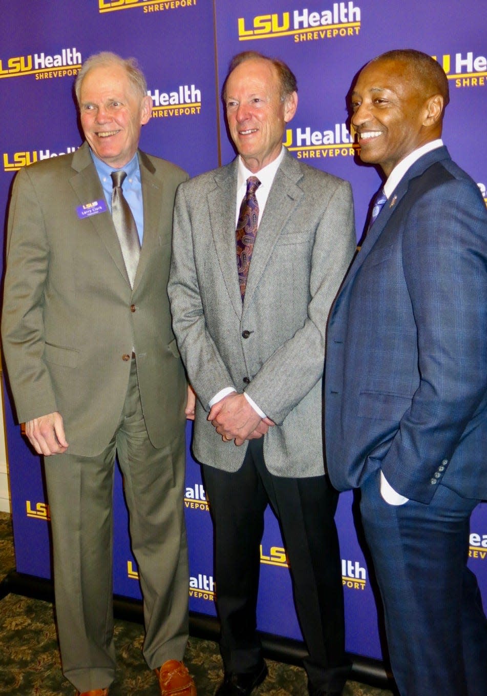 LSUS Chancellor Dr. Larry Clark, new LSU Health
Chancellor Dr. David S. Guzick, and LSU President Dr. William F. Tate IV.