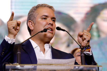 Presidential candidate Ivan Duque speaks to supporters after winning the presidential election in Bogota, Colombia, June 17, 2018. REUTERS/Nacho Doce