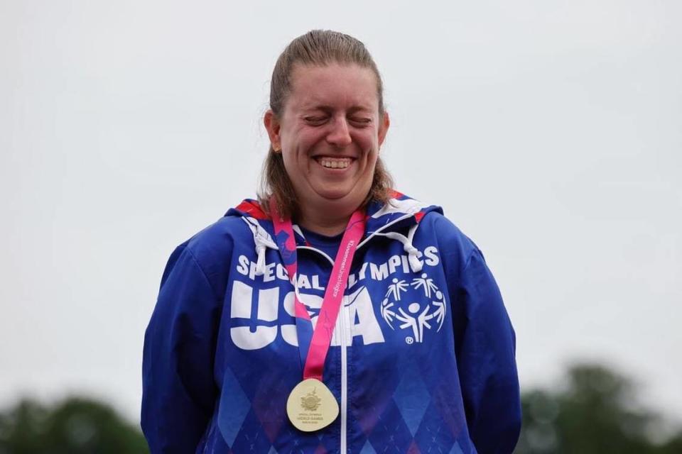 Charlotte Lewis with her gold metal for the women’s 200-meter kayaking race at the Special Olympics World Games in Germany.