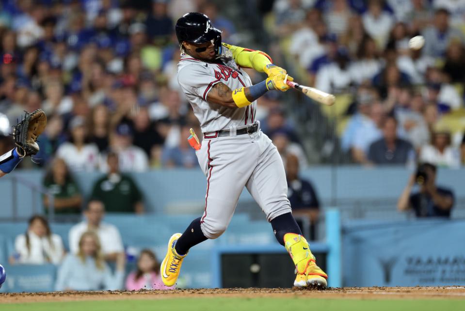 LOS ANGELES, CALIFORNIA - AUGUST 31: Ronald Acuna Jr. #13 of the Atlanta Braves hits a grand slam home run against starting pitcher Lance Lynn #35 of the Los Angeles Dodgers during the second inning at Dodger Stadium on August 31, 2023 in Los Angeles, California. (Photo by Kevork Djansezian/Getty Images)