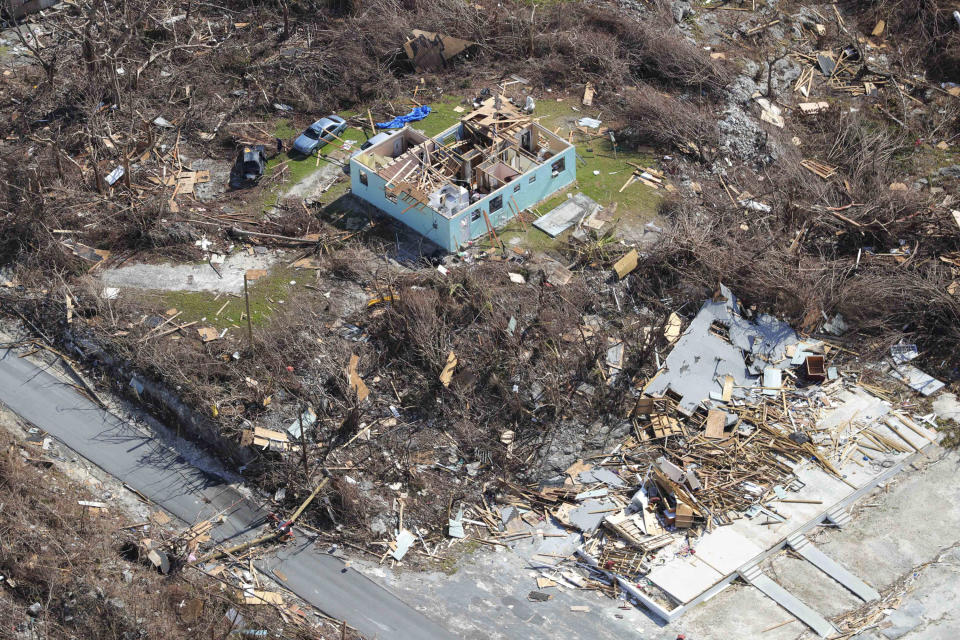 In this handout photo provided by the Dutch Defense Ministry taken on Wednesday, Sept. 11, 2019, the aftermath of Hurricane Dorian is seen on the island of Abaco in the Bahamas. Two Dutch navy ships have arrived in the Bahamas to help with the relief operation after the region was devastated by Hurricane Dorian. The Defense Ministry says that around 550 military personnel who arrived Wednesday on board the ships Snellius and Johan de Witt will deliver aid to residents on Abaco island. (Sjoerd Hilckmann/Dutch Defense Ministry via AP)