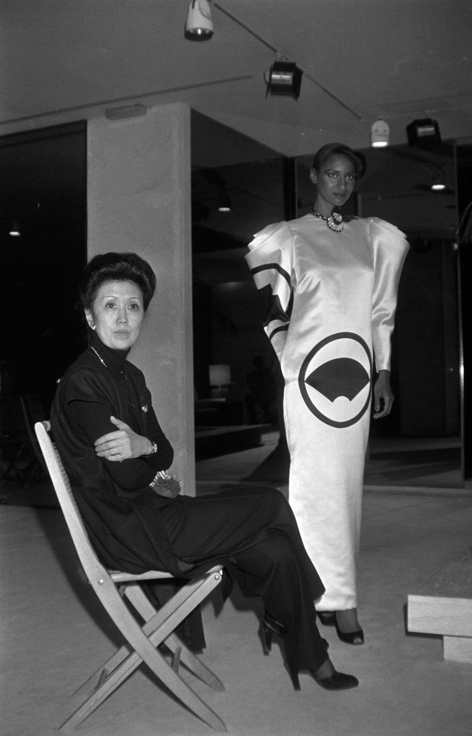 Designer Hanae Mori poses for a portrait with model Gloria Burgess.