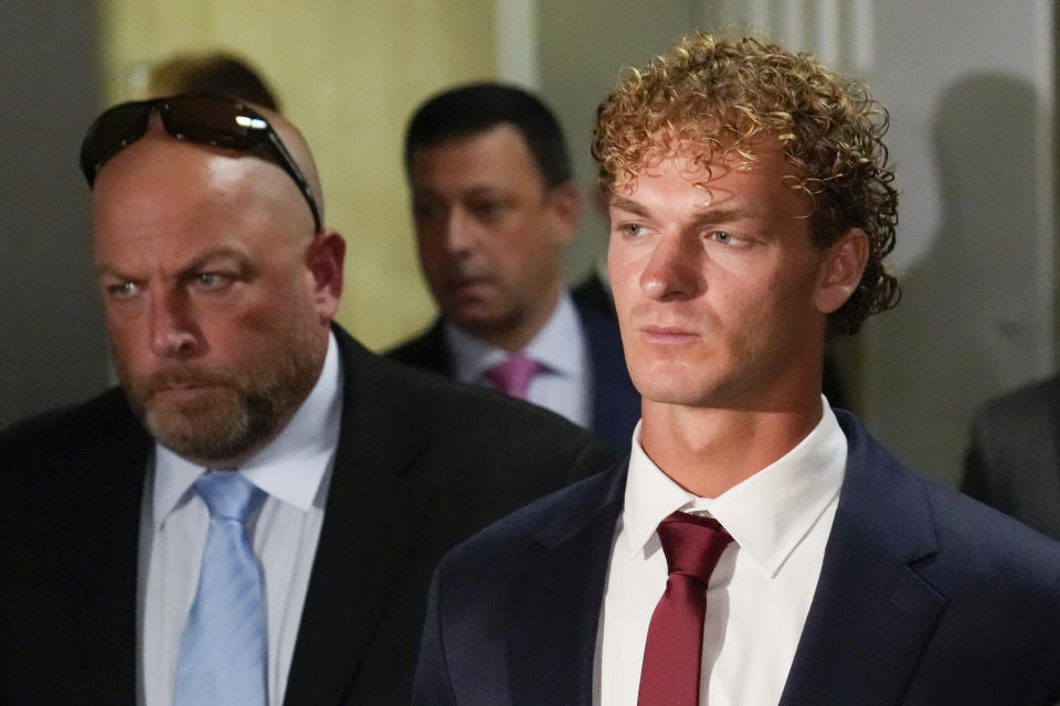 Daniel Penny departs Manhattan Criminal Court following his arraignment, Wednesday, June 28, 2023, in New York. Penny, 24, pleaded not guilty to second-degree manslaughter and criminally negligent homicide in the May 1 death of Jordan Neely, a former Michael Jackson impersonator who was shouting and begging for money when Penny pinned him to the floor of the moving subway car with the help of two other passengers and held him in a chokehold for more than three minutes. (AP Photo/John Minchillo)