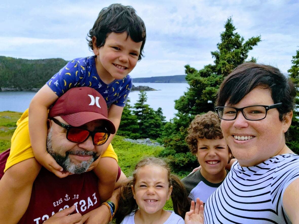 Kimberly Young, pictured here with her husband and three children, says two of her children are already enrolled in French immersion and she would like her youngest child, Jasper, to have the same opportunity.  (Submitted by Kimberly Young - image credit)