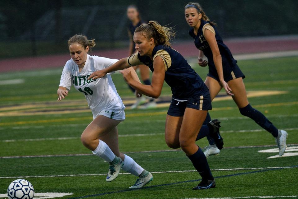 Shrewsbury's Lauren Bobolia, right, races Sutton's Madeline Joyce to the ball during Tuesday's game.