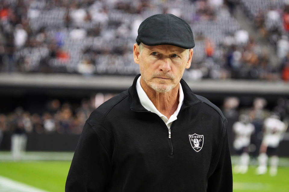 FILE - Las Vegas Raiders general manager Mike Mayock walks the sideline during an NFL football game against the Chicago Bears, Sunday, Oct. 10, 2021, in Las Vegas. On Monday, Jan. 17, 2022, the Las Vegas Raiders announced they have fired Mayock after three seasons and will begin a search for a coach and GM following their second playoff berth in the past 19 seasons. (AP Photo/Rick Scuteri, File)