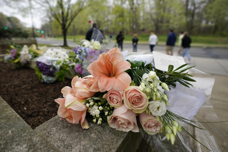 Flowers left by members of the public are seen outside the British Embassy in Washington, Friday, April 9, 2021. Buckingham Palace officials say Prince Philip, the husband of Queen Elizabeth II, has died. He was 99. Philip spent a month in hospital earlier this year before being released on March 16 to return to Windsor Castle. (AP Photo/Carolyn Kaster)