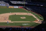 Toronto Blue Jays' Ernie Clement, third from right, grounds into a force out during the seventh inning of a baseball game against the New York Yankees, Sunday, April 7, 2024, in New York. (AP Photo/Frank Franklin II)