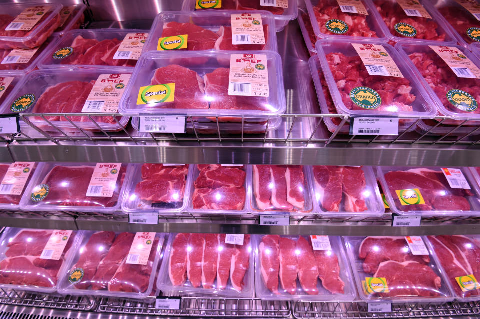 Pictured is packaged meat inside a Woolworths store.
