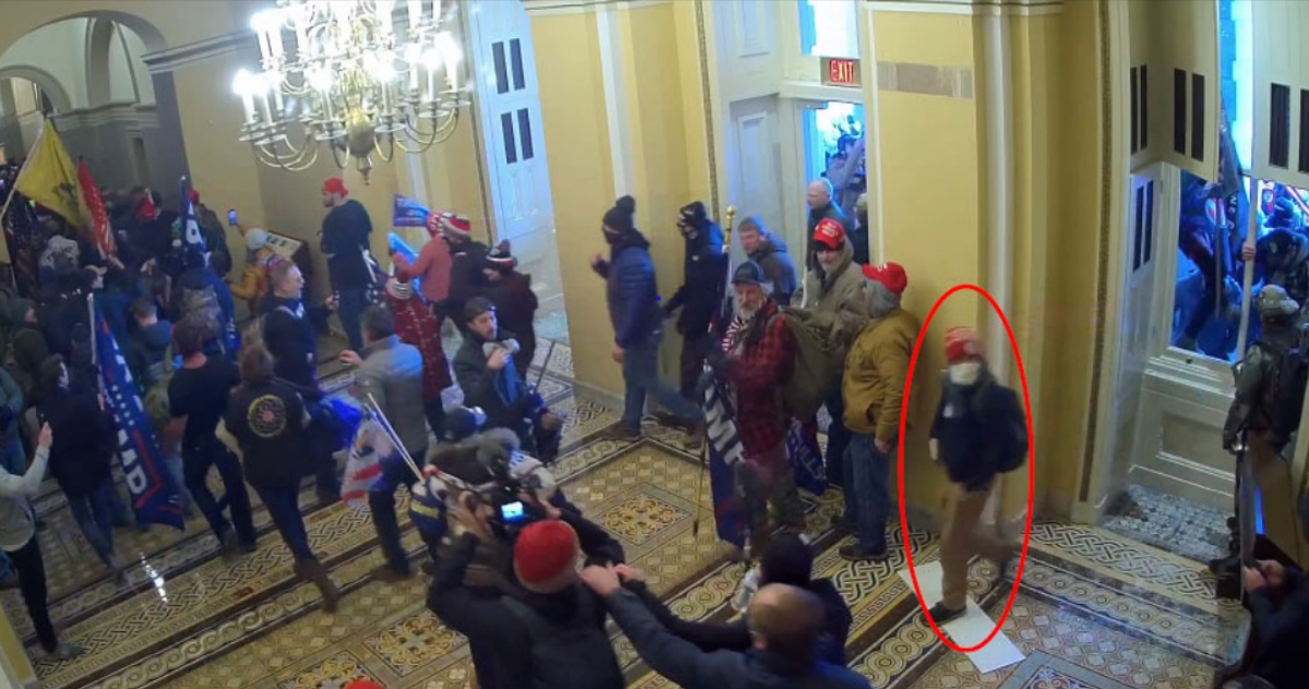 A red circle identifies the man the FBI believes is Paul Caloia in the US Capitol on 6 January 2021. (Federal Bureau of Investigation)
