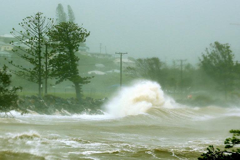 Waves crash into a breakwall after Tropical Cyclone Marcia made landfall in the coastal town of Yeppoon in north Queensland on February 20, 2015