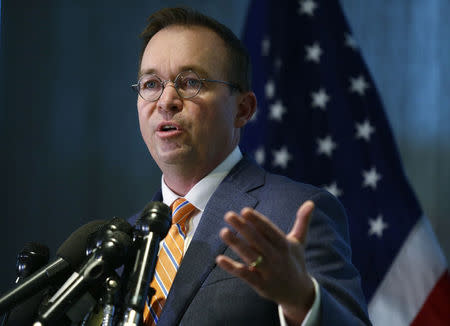 Office of Management and Budget (OMB) Director Mick Mulvaney speaks to the media at the U.S. Consumer Financial Protection Bureau (CFPB), where he began work earlier in the day after being named acting director by U.S. President Donald Trump in Washington November 27, 2017. REUTERS/Joshua Roberts