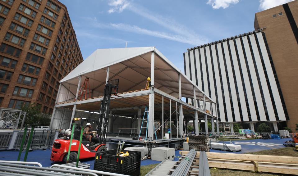 Crews work to put up a large two story hospitality tent on Parcel 5 that will be used for the upcoming Rochester International Jazz Festival in Rochester Wednesday, June 8, 2022.  The festival starts June 17th and runs through June 25th. 