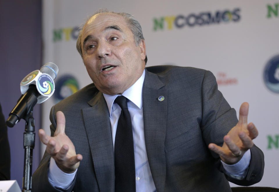 FILE - In this Tuesday, March 21, 2017 file photo, Rocco Commisso, speaks to reporters during a news conference in the Brooklyn borough of New York. Italian-American businessman Rocco Commisso has completed his takeover of Serie A club Fiorentina. Less than six months into his tenure as Fiorentina owner and president, Rocco Commisso is already starting to grapple with Italy’s infamous bureaucracy as he attempts to build a new stadium for the club. First, Commisso’s plan to overhaul the existing Stadio Artemio Franchi was rejected by the city committee that protects monuments. Now he is awaiting approval to build a new ground, perhaps near the city’s airport. (AP Photo/Seth Wenig, File )