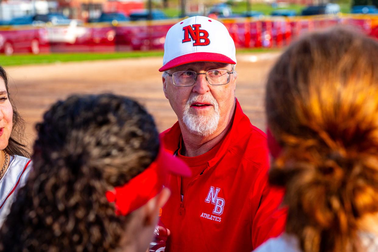 New Bedford coach Harry Lowe speaks to the team following the 10-4 victory over Bridgewater-Raynham and clinching Lowe's 600th career victory.