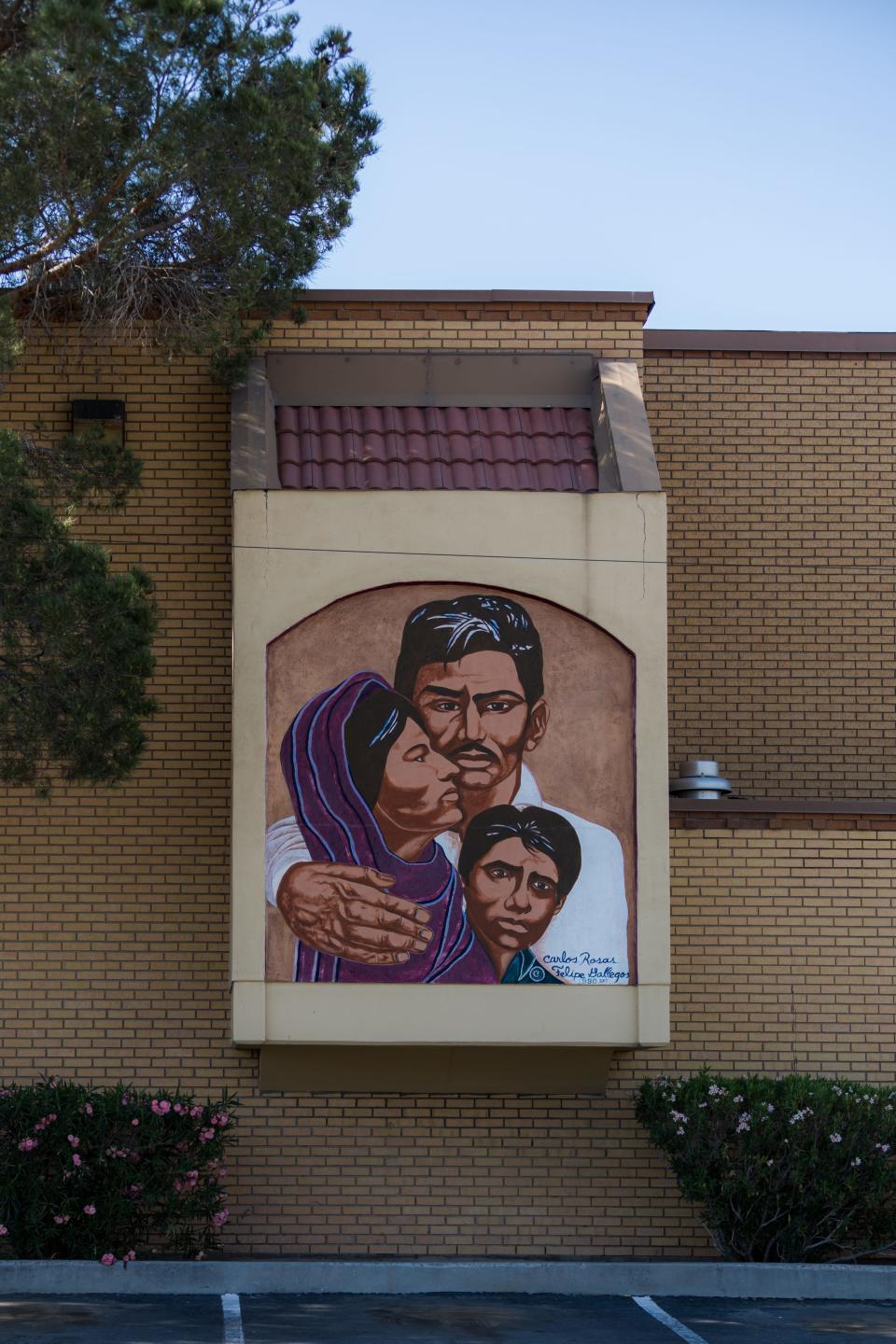 "Sacred Family, Tribute to the Chicano Family," was painted by Carlos Rosas, assisted by Felipe Gallegos in 1990. The mural is located at 700 S. Ochoa St. at the exterior north wall or La Fe Clinic in Segundo Barrio in El Paso, Texas.