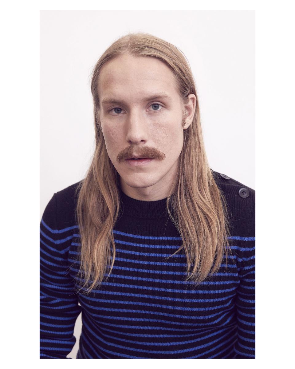 Petter Lundgren in a striped recycled- and organic-wool sweater.