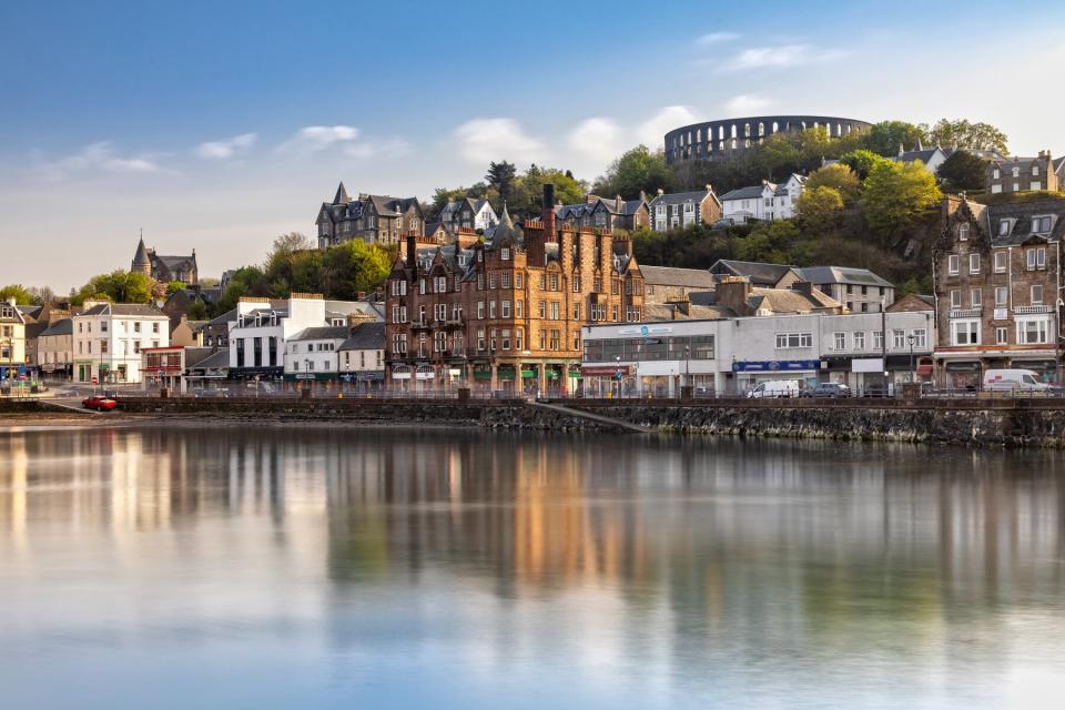 The Harbour of Oban and the Mccaig's Tower reflecting in the Water