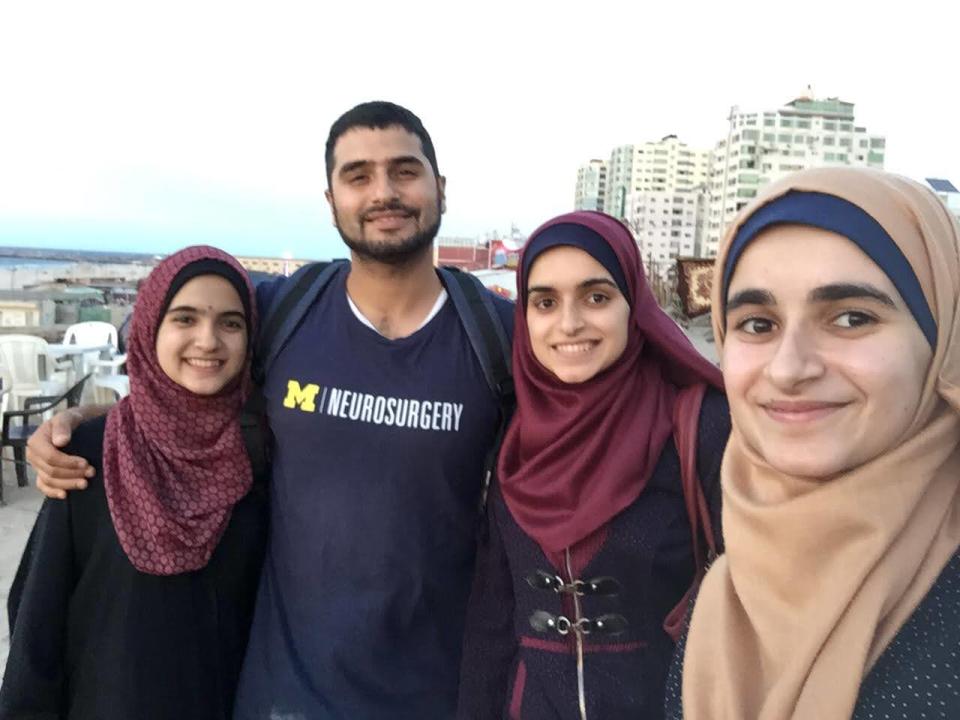 Yamaan Saadeh with his three sisters, Huda, Heba and Shahd. All three women are medical students in Gaza, where they are currently trapped along with their parents. Saadeh worries they may not survive the war.