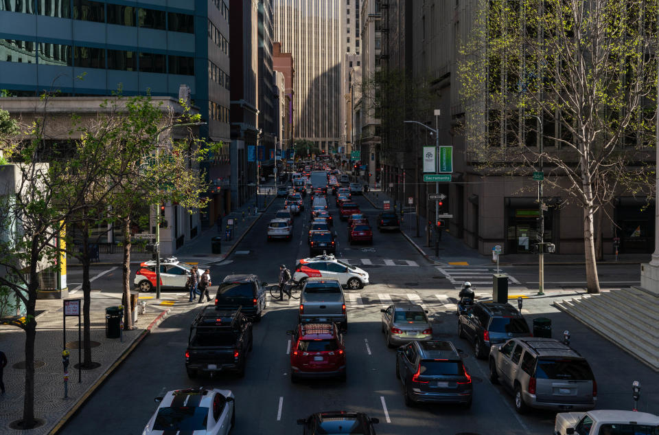 A Cruise self-driving taxi navigates traffic in San Francisco.