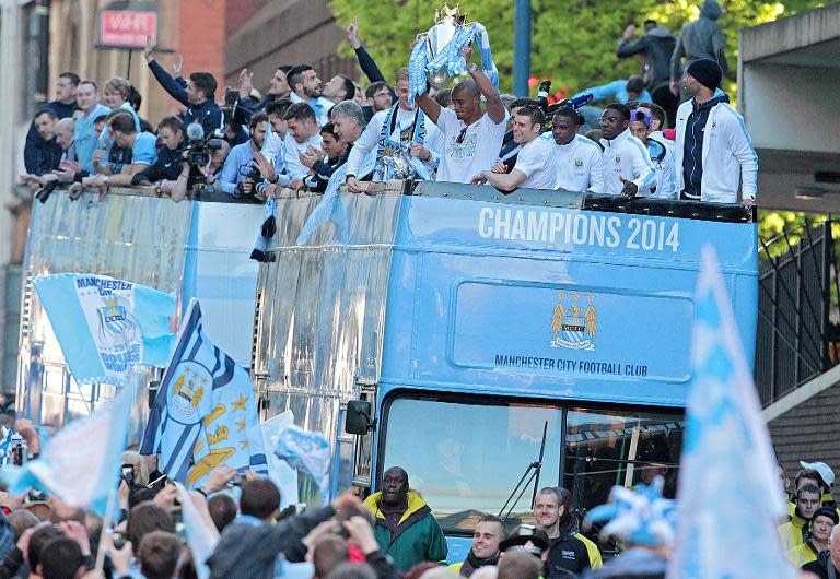 Manchester City's victory parade in May 2014 as the club celebrated becoming Premier League champions