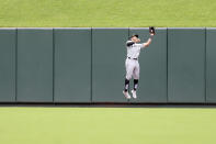 Chicago White Sox center fielder Tommy Pham catches a fly ball hit by St. Louis Cardinals' Lars Nootbaar during the sixth inning of a baseball game Sunday, May 5, 2024, in St. Louis. (AP Photo/Scott Kane)