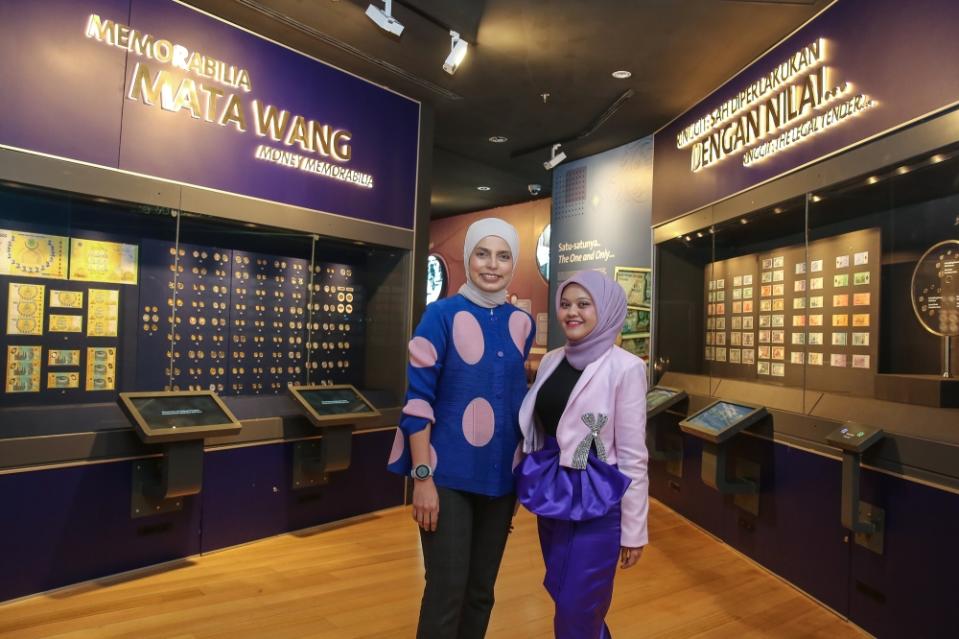 Bank Negara Malaysia Museum and Art Gallery director Noreen Zulkepli (right) and  deputy director Alnizah Shamsudeen pose for a picture during an interview with Malay Mail at Sasana Kijang in Kuala Lumpur March 21, 2024. — Picture by Yusof Mat Isa