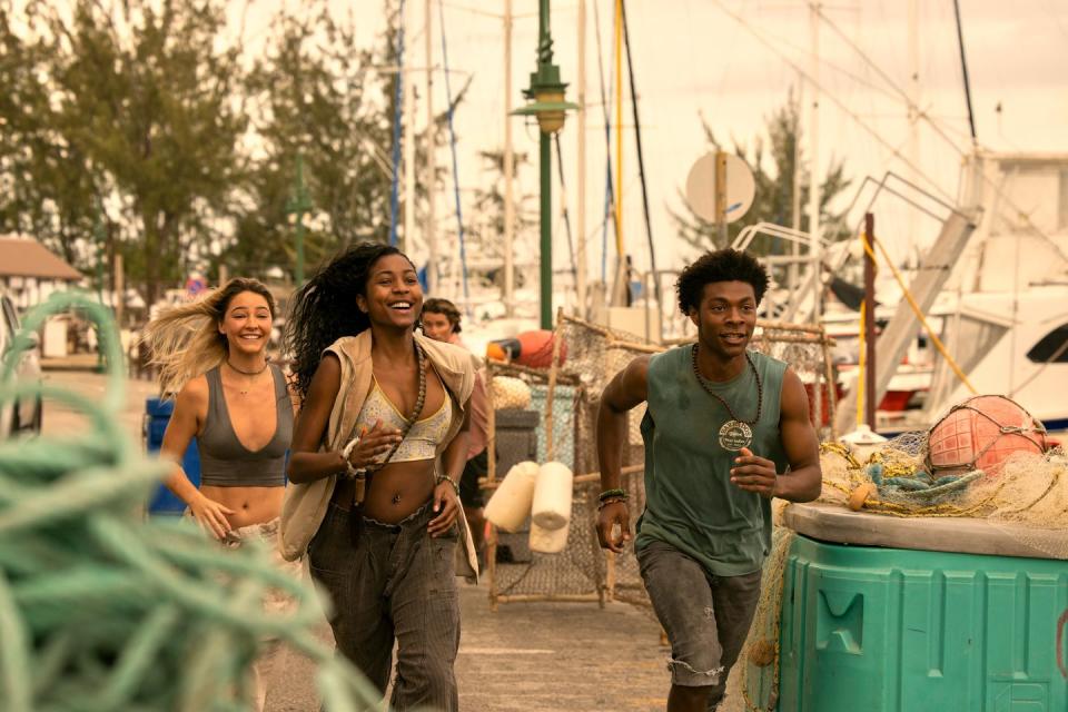 outer banks l to r madelyn cline as sarah cameron, carlacia grant as cleo, jonathan daviss as pope in episode 302 of outer banks cr jackson lee davisnetflix © 2023