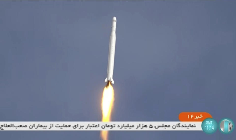 This image taken from video footage aired by Iranian state television on Tuesday, March 8, 2022, shows the launch of a rocket by Iran's Revolutionary Guard carrying a Noor-2 satellite in northeastern Shahroud Desert, Iran. Iran launched the reconnaissance satellite just as world powers awaited Tehran's decision in negotiations over the country's tattered nuclear deal. (Iranian state television via AP)