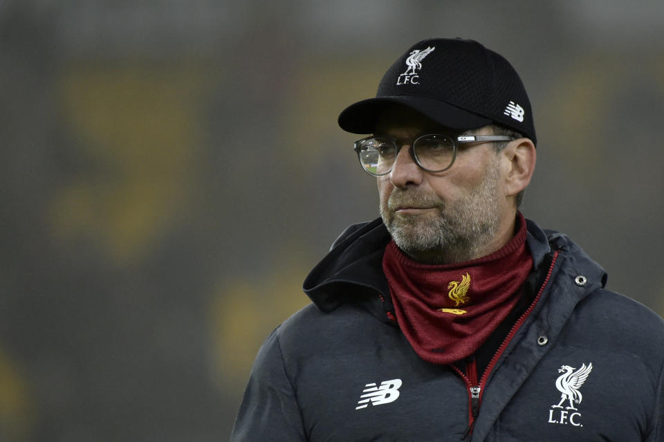 Liverpool's manager Jurgen Klopp looks on during warm up before the English Premier League soccer match between Wolverhampton Wanderers and Liverpool at the Molineux Stadium in Wolverhampton, England, Thursday, Jan. 23, 2020. (AP Photo/Rui Vieira)