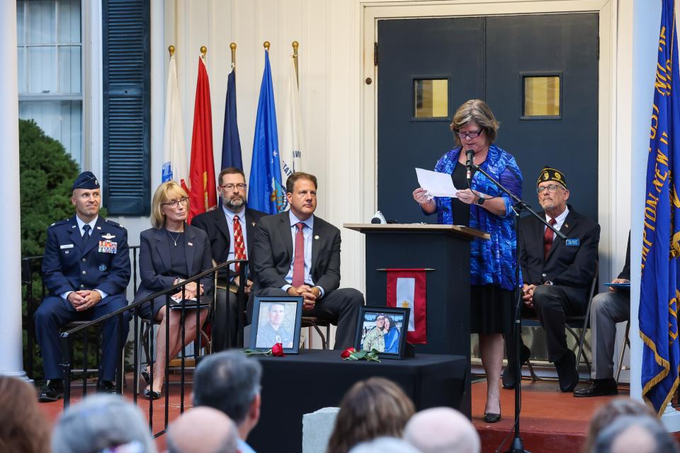 Susan Losapio shares a letter written by her son, Capt. Nicholas P. Losapio during  Sunday's American Legion Post 35 Global War On Terrorism Monument rededication Sept. 11, 2022 in Hampton.