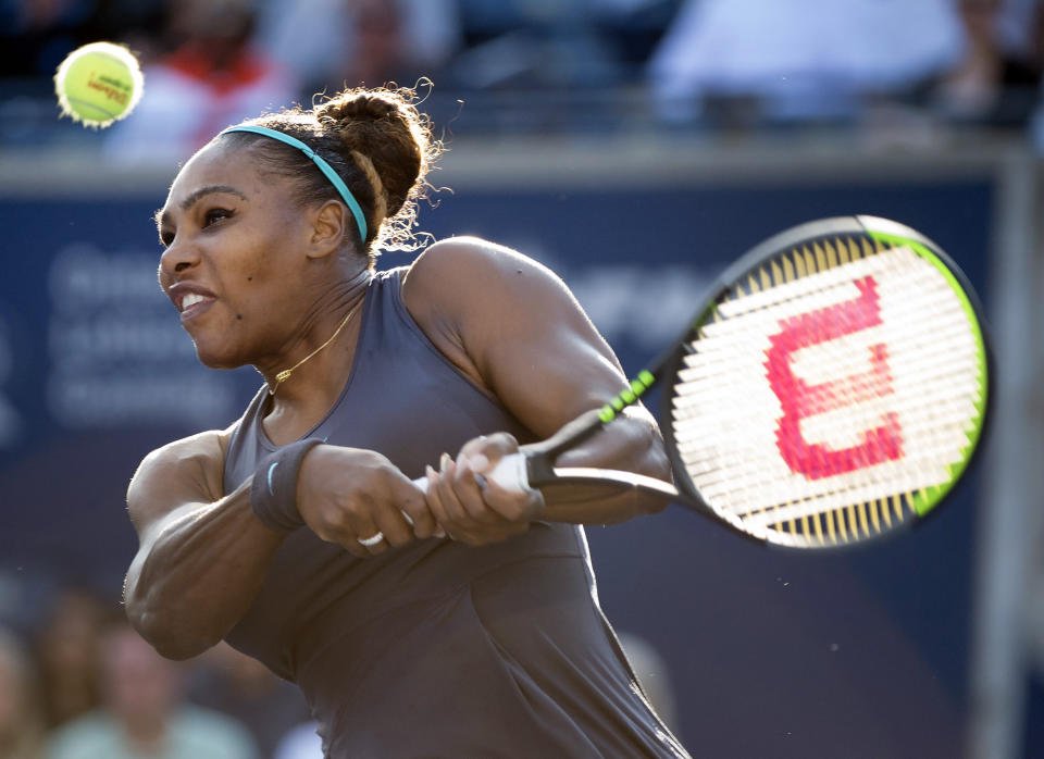 Serena Williams, of the United States, returns the ball against Marie Bouzkova, of the Czech Republic, during semifinal Rogers Cup tennis tournament action in Toronto, Saturday, Aug. 10, 2019. (Nathan Denette/The Canadian Press via AP)