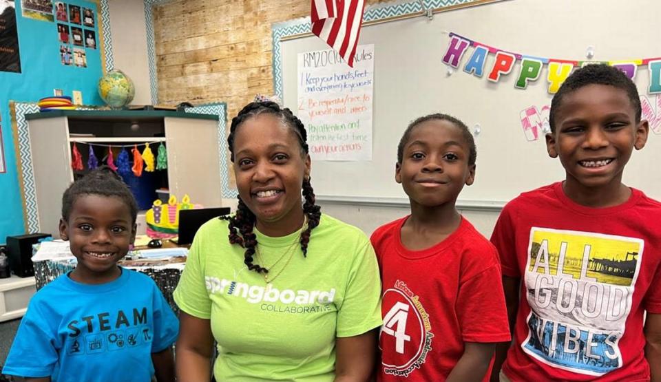 Teacher Jasmine Burris-Marby, shown here with students from this summer’s literacy program, has been a teacher on special assignment with Fresno Unified’s African American Academic Acceleration Department.