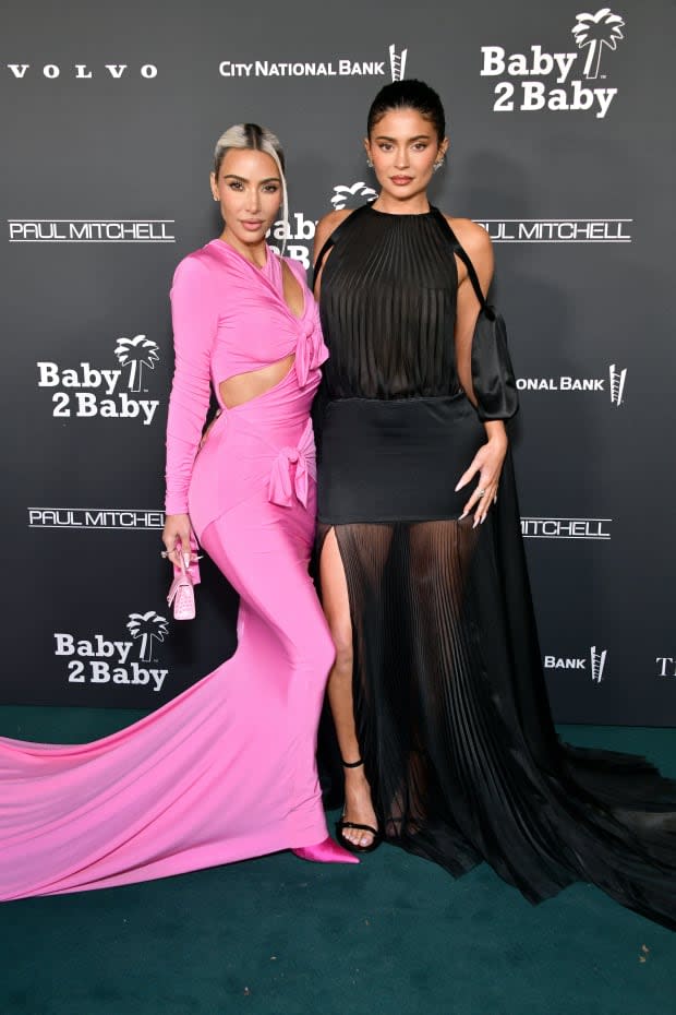 WEST HOLLYWOOD, CALIFORNIA - NOVEMBER 12: (L-R) Kim Kardashian and Kylie Jenner attend the 2022 Baby2Baby Gala presented by Paul Mitchell at Pacific Design Center on November 12, 2022 in West Hollywood, California. (Photo by Araya Doheny/Getty Images for Baby2Baby)<p><a href="https://www.gettyimages.com/detail/1441102272" rel="nofollow noopener" target="_blank" data-ylk="slk:Araya Doheny/Getty Images;elm:context_link;itc:0;sec:content-canvas" class="link ">Araya Doheny/Getty Images</a></p>