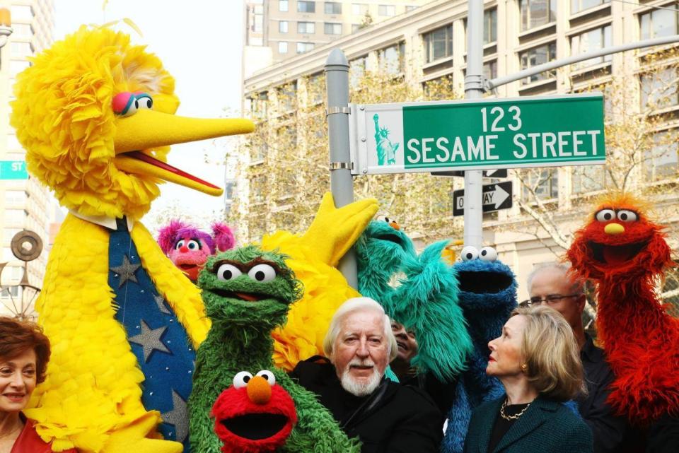 Caroll Spinney with Sesame Street co-founder and TV producer Joan Ganz Cooney celebrating the shows 40th anniversary (Getty)