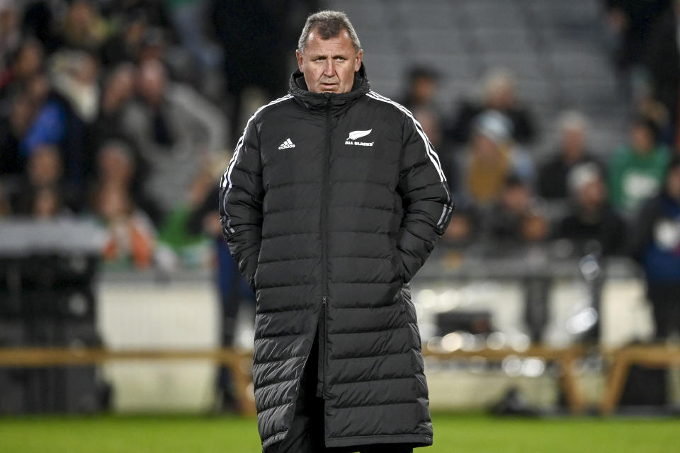 New Zealand All Blacks coach Ian Foster watches his players warm-up ahead of the rugby international between the All Blacks and Ireland at Eden Park in Auckland, New Zealand, Saturday, July 2, 2022. (Andrew Cornaga/Photosport via AP)