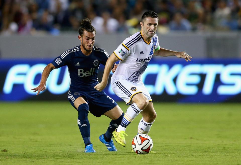 Russell Teibert, Vancouver Whitecaps, and Robbie Keane, Los Angeles Galaxy (Jeff Gross/Getty Images)