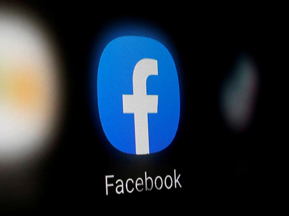 FILE PHOTO: A Facebook logo is displayed on a smartphone in this illustration taken January 6, 2020. REUTERS/Dado Ruvic/Illustration